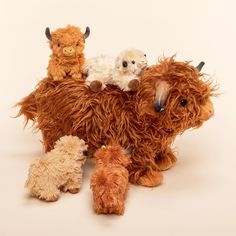 a group of stuffed animals sitting next to each other