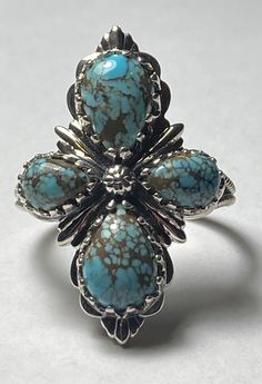 Stunning Artisan Crafted Natural Turquoise Four Leaf Floral Ring with Split Shank 1.25” Top to Bottom Sz9 Unisex piece Gift Boxed Free Polishing Cloth! Please check my other listings Thanks for looking ! Shipping 1 business day Please leave Positive Feedback! If you are not Satisfied contact us directly Your Satisfaction is our Priority! Floral Ring, Four Leaves, Split Shank, Four Leaf, Natural Turquoise, Four Leaf Clover, Artisan Craft, Clover Leaf, Blue Moon