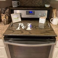 Picture of a Stove top Cover that has handles and that sits up off the top of the stove top. Flat Top Stove, Wooden Stove Top Covers, Wooden Stove, Oven Cover, Sink Cover, Noodle Board, Stove Top Cover, Burner Covers, Serving Tray Wood