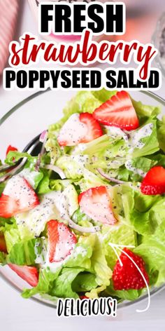 fresh strawberry poppy seed salad in a glass bowl on a white table with text overlay