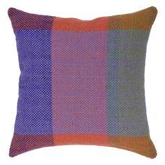 a multicolored pillow on a white background