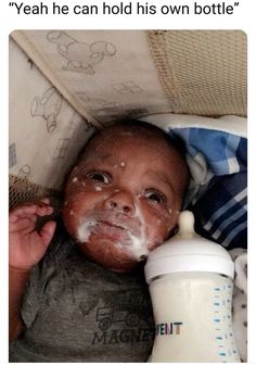 a baby laying down next to a bottle with food on it's face and the caption reads, yeah he can hold his own bottle