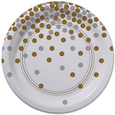 a white and gold polka dot paper plate