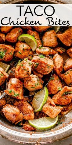 chicken bites in a skillet with limes and cilantro