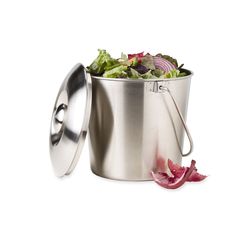 a large metal pot filled with lettuce and red onions