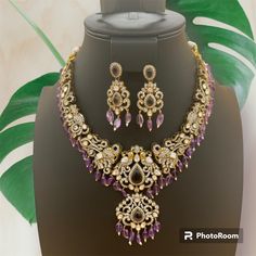 Luxurious Victorian Diamond Kundan Purple Beads Necklace with Parrots & Elephants along with earring's included with it. Beaded Chandbali Jewelry Sets For Gifts, Purple Round Beads Jewelry For Festive Occasion, Purple Beaded Jewelry For Festive Occasions, Purple Jewelry For Festivals And Celebrations, Elegant Purple Kundan Necklace As Gift, Traditional Purple Beaded Jewelry, Elegant Purple Jewelry For Festivals, Bollywood Style Jewelry With Dangling Beads As Gift, Elegant Purple Kundan Necklace For Festive Occasions