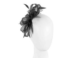 Elegant design featuring loops with feathers. This stunning black headpiece is hand made to order by us in Melbourne and we can make it in any colour, making it a perfect choice as a bridal headpiece or flower girl fascinator. If you do not find the required colour in our colour chart, you can send us a small piece of fabric and we will match it for you. Leave us a comment with your order about color if custom design is required. From wedding to Melbourne Cup or Ascot, this fascinator will turn Elegant Black Fascinator With Feather Trim, Black Event Headband, Elegant Black Mini Hat With Feather Trim, Elegant Black Feathered Fascinator, Elegant Black Fascinator With Feathers, Elegant Black Feather Fascinator, Adjustable Black Feather Headpiece, Elegant Black Feather Hair Accessories, Adjustable Black Feathered Headpiece