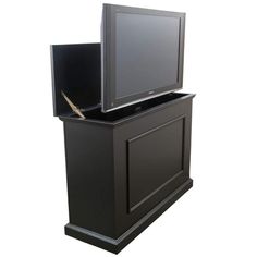 an entertainment center with a flat screen tv on it's side and door open