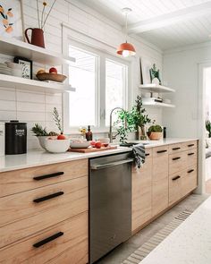 the kitchen is clean and ready for us to use it's dishwasher