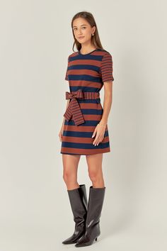 This Contrast Stripe Knit Mini Dress is perfect for any fashionista. With its bold stripe print round neckline and short contrast sleeves this mini dress is sure to turn heads. The waist strap adds extra detail and helps to accentuate the wearer's figure. This dress is perfect for day or night and the bold eye-catching colors ensure you stand out from the crowd. Show off your style and make a statement with this stylish dress. Stripe Round neckline Contrast short sleeves Side waist strap Mini le Bold Eyes, English Factory, Bold Stripes, Waist Strap, Knit Mini Dress, Navy Pink, Striped Knit, Stand Out From The Crowd, Stripe Print