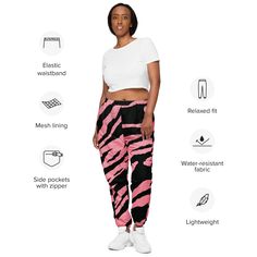 ABOUT These gorgeous Pink Tiger print unisex track pants are your new go-to piece for working out or styling a streetwear outfit. The water-resistant, lightweight fabric and mesh lining provide comfort, while elastic ankle cuffs will make it easy for you to show off your kicks. Style it with a windbreaker for a complete look and feel. DETAILS• 100% polyester• Lightweight, water-resistant fabric• Fully lined, mesh lining • Relaxed fit• Elastic waistband and ankle cuffs• Zip pockets• Sits at hip S Pink Tiger Print, Pink Tiger, Ankle Cuffs, Water Resistant Fabric, Tiger Print, Streetwear Outfit, Workout Wear, Workout Pants, Working Out