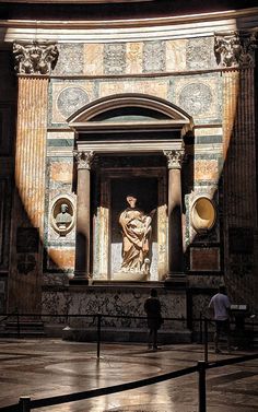 an image of a statue in the middle of a building