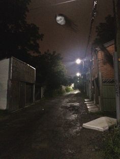 an empty street at night with no one on it