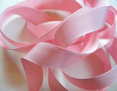 "This listing is for one (1) yard of vintage USA grosgrain from the 1940's-50's. This ribbon is 7/8\" wide, 58% rayon and 42% cotton in a gorgeous, true pink color. This is a beautifully soft, pliable ribbon and very unlike the stiff grosgrain ribbon that is made today. Because of the all natural fibers, you may dye it, strip it, wash it, iron it, etc. This ribbon would be perfect for hats, sashing, pleating, trim, bows or any other sewing or craft project. In perfect, unused vintage condition. Vintage Ribbon, Vintage Usa, Grosgrain Ribbon, Natural Fibers, All Natural, Pink Color, Lace Trim, Craft Projects, Dye