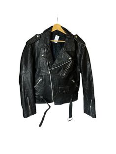 Vintage y2k Biker Leather Jacket Zippered fastening  3 front pockets  1 interior pocket Multiple signs of wear and holes on the lining Overall good condition please see photos  Size on tag L, fits L men Please check measurements  Shoulder to shoulder: 50cm Pit to pit: 58cm Sleeve: 64cm Length: 60cm E491 Leather Jacket Zipper, Biker Leather Jacket, Biker Leather, Biker Jacket, Romania, Vintage Y2k, Gender Neutral, Overalls, Bathing Beauties