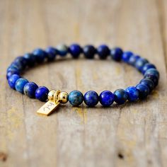 The Handmade Natural Lapis Lazuli Beaded Bracelet with a Gold Plated Tag looks great. It will make the perfect gift 🎁 for someone special, or treat yourself as you deserve it 💖 🥰 These Bracelets have been made using high quality Natural Lapis Lazuli and have a Gold Plated Tag with MC for MantraChakra. They are available as 4mm, 6mm and 8mm. Lapis Lazuli brings out your inner priestess, heightens inner-vison and deepens wisdom. It benefits the Throat Chakra with communication and expression of Minimalist Beaded Bracelets As Gift, Adjustable Lapis Lazuli Bracelet With 8mm Beads, Gift Lapis Lazuli Round Bead Bracelets, Gift Lapis Lazuli Bracelets With Round Beads, Lapis Lazuli Bead Bracelet Gift, Gift Lapis Lazuli Beaded Bracelets With Polished Beads, Lapis Lazuli Beaded Bracelet Gift, Lapis Lazuli Gemstone Beads Bracelet For Gift, Lapis Lazuli Gemstone Beaded Bracelet For Gifts