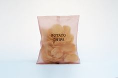 potato chips in a pink bag on a white background with the words potato chips printed on it