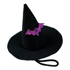 a black hat with a purple bat on the front and pink sequins on the back