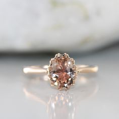 A single oval brilliant 9x7 mm morganite is set creatively in the center of a basic solid 14k rose gold. This listing price is for ONE ring only This ring will come with a Certificate of Authenticity card, at no additional cost. Customers are guaranteed full year warranty coverage on the jewelry they purchase from us. Jewelry will only be granted coverage for one accidental incident, and not if it is lost or stolen. The damaged jewelry must be sent back to our factory for inspection by our in-ho Classic Oval Morganite Diamond Ring, Oval Morganite Jewelry For Proposal, Oval Morganite Promise Jewelry, Rose Gold Oval Morganite Topaz Ring, Pink Gold Morganite Oval Ring, Rose Gold Engagement Ring Simple, Peach Morganite Engagement Ring, Rose Gold Morganite, Engagement Rings Bridal Sets