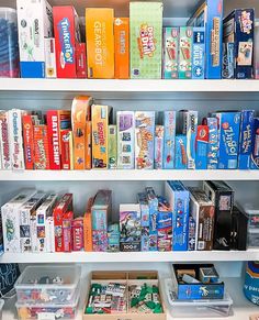 the shelves are filled with different types of snacks