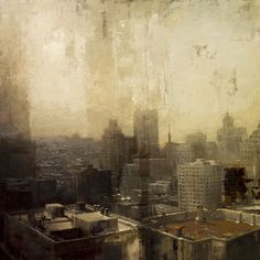 an image of a cityscape with buildings in the foreground and clouds in the background