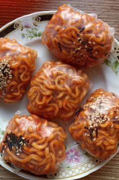 four pieces of food sitting on top of a plate