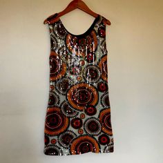 Sequined, Unique Dress. Excellent Quality. Great For Parties Or Just Fun! Mid To Upper Thigh Length With Peeks Boo Back.Size Large But Fits Like An 8. Sequined Sleeveless Mini Dress For Costume Party, Fitted Orange Sleeveless Dress For Party, Orange Fitted Sleeveless Party Dress, Orange Stretch Sleeveless Dress For Party, Stretch Orange Sleeveless Dress For Party, Summer Sequin Mini Dress With Stretch, Summer Stretch Mini Sequin Dress, Summer Mini Sequin Dress With Stretch, Summer Mini Length Stretch Sequin Dress