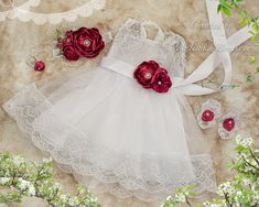 "An elegant and unique outfit for that special little girl 1.A light and elegant white dress with a chiffon layer on top, lined at the bottom hem with matching lace measuring about 3\", and with the same lace lining the outer third on each side of the top's front side. To add a touch of extra character, the middle of the top has the chiffon slightly gathered on either end to give a slight pleated look. The sleeveless arm openings and neckline are trimmed with crocheted lace in a scalloped design Cranberry Dress, Fabric Flower Headbands, Elegant White Dress, Top Pearl, Scalloped Design, Outfit Baby Girl, Unique Outfit, Chiffon Overlay, Birthday Cake Smash