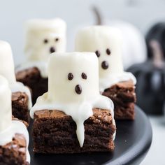 chocolate brownies with marshmallows and ghost faces on them