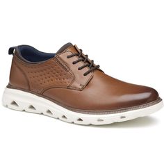 This men's plain toe shoe showcases a classic sneaker design with modern comfort. Crafted from full-grain leather, the upper offers a timeless, polished look that you can dress up or down for any occasion. The covered EVA footbed and EVA outsole work together to provide superior cushioning and lightweight support, ensuring all-day comfort and durability. The painted welt adds a distinctive touch, enhancing the shoe's refined appearance while protecting the edges. Ideal for making a stylish impre Casual Low-top Dress Shoes With Perforated Toe Box, Leather Low-top Dress Shoes With Ortholite Insole, Business Casual Sneakers With Ortholite Insole, Casual Low-top Dress Shoes With Stitched Sole, Casual Brown Dress Shoes With Perforated Toe Box, Low-top Dress Shoes With Perforated Toe Box For Derby, Mens Dress Sneakers, Fashion Shoes For Men, Dress Sneakers