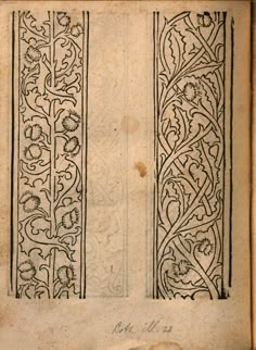 an open book with intricate designs on it