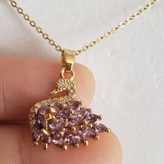 Beautiful Swan Pendant With Purple Crystal An Stainless Steel Necklace... Purple Pendant Jewelry For Party, Purple Clavicle Chain Pendant Necklace, Party Purple Clavicle Chain Necklaces, Elegant Purple Necklace With Lobster Clasp, Pink Amethyst Pendant Necklace, Swan Pendant, Beautiful Swan, Purple Crystal, Fancy Jewelry