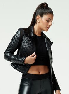 Say goodbye to sacrificing comfort and range of motion for style. The ACCELERATION ASYM MOTO MESH JACKET is designed with power mesh inserts, adjustable lace-up back, and quilted leather panels to provide unrestricted mobility and all-day comfort, while the side zip pockets, zipper on cuffs and pockets, and breathable power mesh allow for chic practicality. Experience a perfect harmony of luxury and comfort. FEATURES & BENEFITS Adjustable Lace-Up Back Side Zip Pockets Power Mesh Inserts For Rang Fitted Quilted Biker Outerwear, Fitted Quilted Biker Jacket With Long Sleeves, Quilted Fitted Biker Jacket With Long Sleeves, Fitted Leather Quilted Jacket, Sporty Black Biker Jacket For Motorcycling, Sporty Biker Jacket For Motorcycling In Fall, Black Quilted Biker Jacket For Fall, Fitted Quilted Biker Jacket For Fall, Quilted Fitted Biker Jacket For Fall