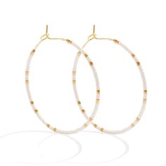 Delicate hoop earrings adorned with genuine Miyuki Delica beads from Japan. Offering a 1.5" drop makes these earrings perfect for just about any desired vibe! And the best part is the fun colors to choose from! Brass PLATED Miyuki Delica Beads from Japan, Assembled in China Trendy White Round Hoop Earrings, White Circular Jewelry For The Beach, Adjustable Nickel-free White Hoop Earrings, Adjustable White Nickel Free Hoop Earrings, White Hoop Jewelry For Summer, White Round Bead Earrings For Everyday, Nickel Free White Circle Hoop Earrings, Nickel-free White Circle Hoop Earrings, White Hoop Earrings For Summer