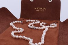 Privileged to sell this beautiful piece. Shows no wear. MIKIMOTO Authentic strand. Comes in original leather case. Details Single strand 20.5inch Saltwater Cultured Akoya pearls high quality A+ 6mm  range Sterling Silver Signature Mikimoto Clasp with 4mm pearl This is an incredibly rare piece. Don't miss out. Valued at $4500 Stock 540 Pearl Necklace Art, Saltwater Pearl Necklace, Three Strand Pearl Necklace, Akoya Pearl Necklace, Mikimoto Pearls, Saltwater Pearls, Silver Pearl Necklace, Akoya Pearls, Tahitian Pearls