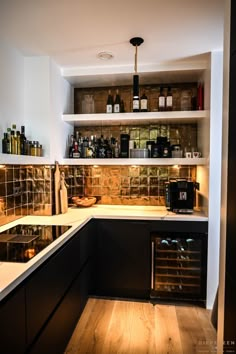 the kitchen is clean and ready to be used as a wine tasting area for guests