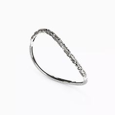 A masterwork of design, forever ahead of the curve. Rare Diamonds, Twisted Bangle, Crystal Structure, Colorless Diamond, Silicone Bracelets, Vs Diamond, American Jewelry, Diamond Clarity, Bracelet Sizes