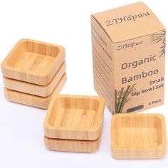 three bamboo square bowls and two boxes on a white background