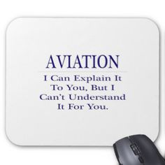 a computer mouse sitting next to a white mouse pad with the words aviation on it