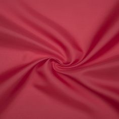 a close up view of a red fabric