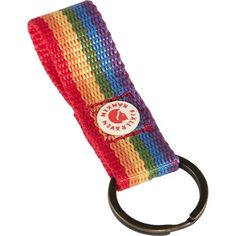 a rainbow colored keychain with a black ring on the front and bottom end