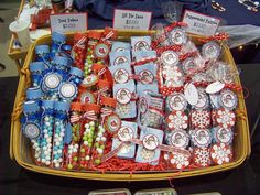 a tray filled with candy and candies on top of a table