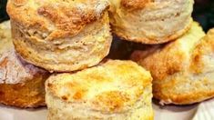 a pile of biscuits sitting on top of a white plate