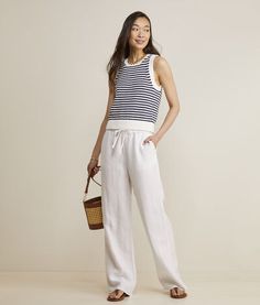 A true warm-weather staple, these wear-with-everything tie-waist linen pants are a must-add to your summer wardrobe. Casual Linen Bottoms For Day Out, Relaxed Fit Linen Wide Leg Pants With Tie Waist, Chic Linen Tie Waist Bottoms, Chic Linen Bottoms With Tie Waist, Casual Linen Pants With Tie Waist, Chic Linen Bottoms For Loungewear, Effortless Spring Vacation Bottoms, Linen Bottoms With Tie Waist, Summer Linen Bottoms With Tie Waist