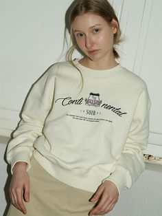 This is a trendy and feminine sweatshirt by SO IR that is made out of high quality and sturdy material. With distinctive mood of the design and comfortable wear, you can style it for your casual daily outfit.- Graphic artwork and embroidery detail- Ribbed cuffs, hem, and neckline- Feminine and minimal mood Trendy Cream Sweatshirt With Relaxed Fit, Trendy Cream Cotton Sweatshirt, Cream Cotton Trendy Sweatshirt, Cream Relaxed Fit Trendy Sweatshirt, Trendy Cream Relaxed Fit Sweatshirt, Trendy Crew Neck Cream Sweatshirt, Casual Cream Crew Sweatshirt, Casual Cream Cotton Sweatshirt, Cream Cotton Casual Sweatshirt