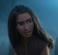 a woman with long hair and big eyes in a scene from disney's avatar