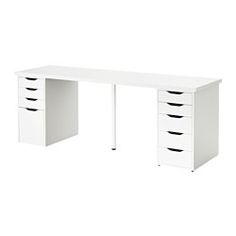 a white desk with five drawers on it