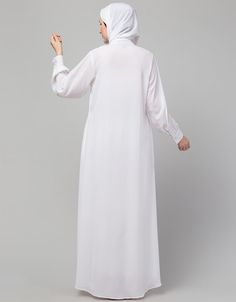 White Hidden Placket front open casual Abaya For Routing very comfortable and easy to wear fit for all daily wear Abaya utility pocket at both side seam Front open band collar functional cuff at sleeve Hijab and band shown in the image can be bought separately Fabric: PartyCare: Mild machine wash/ hand Cold Wash/Dry cleanWe request customers to carefully choose the correct size and dress length referring to our size chart White Long Sleeve Modest Khimar, Casual White Long Sleeve Thobe, Modest Long White Thobe, Modest Long Plain Abaya, Casual Abaya, Moroccan Caftan, Don't Compare, Hip Dress, Band Collar