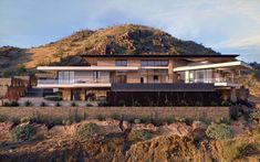 a large house on top of a hill