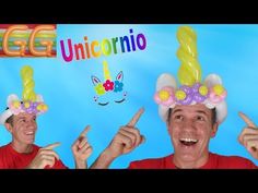 two men with unicorn hats on their heads pointing at the camera and one man holding up his fingers